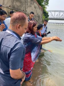 First Lady Sayukta Roopun offering puja to Ganga