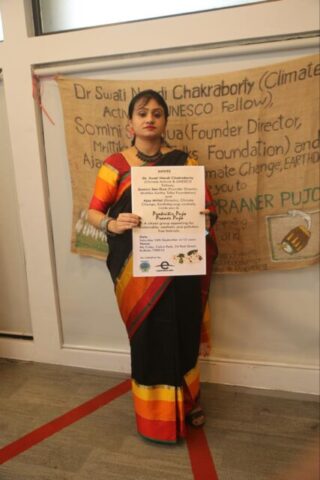 Dr. Swati Nandi Chakraborty with a placard in her hand
